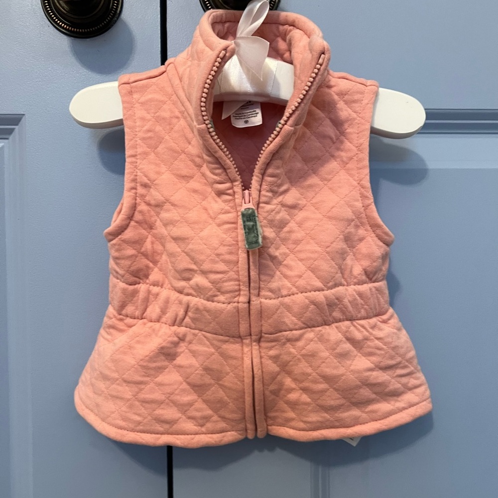 Pink quilted baby vest
